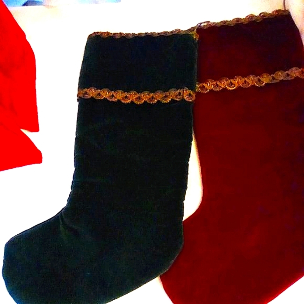 2 velvet stockings. 1 red 1 green  trimed with gold braid